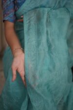 Turqouise silk organza saree with light tapechi embroidery - Image 2
