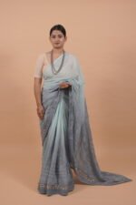 Grey kota chikankari saree with Mukaish work on border