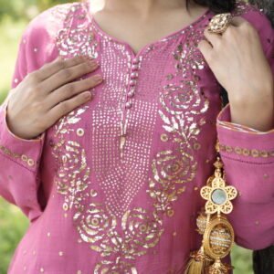 Woman in pink traditional attire