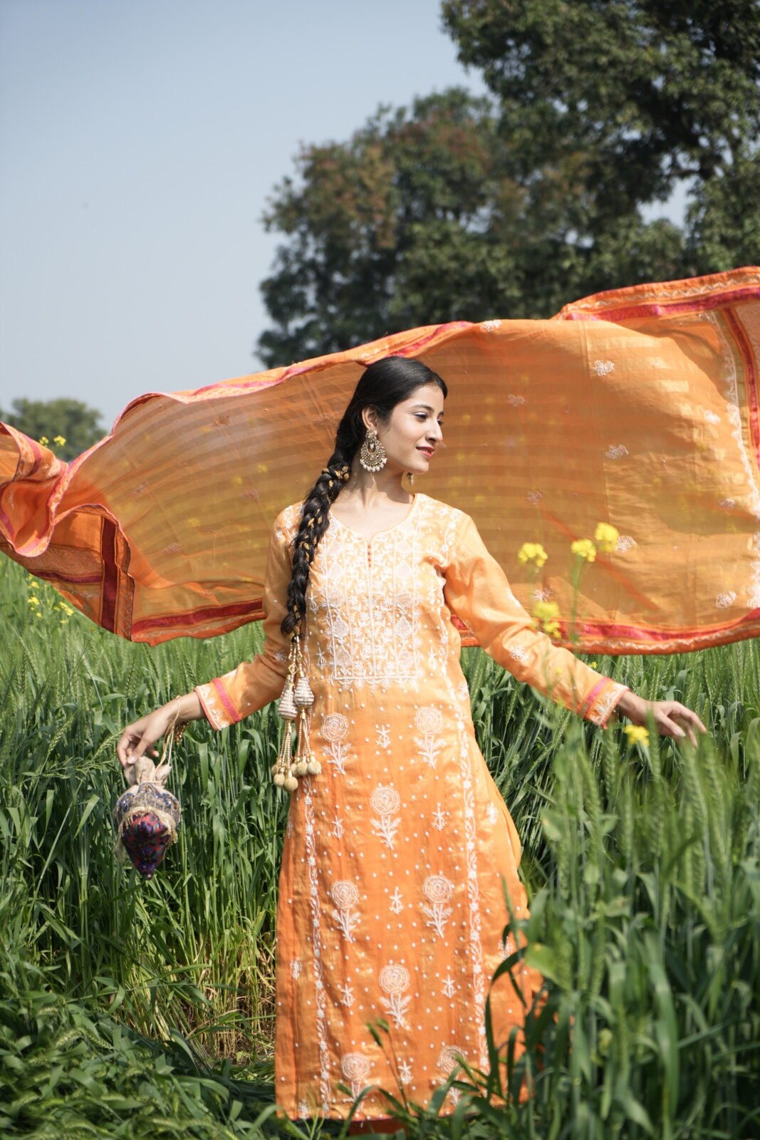 DSC09100 Woman in orange dress outdoors